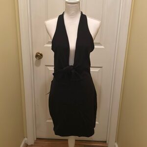 Bebe little Black dress size large. With built in lining. New with tags